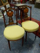 A PAIR OF ORMOLU MOUNTED MARQUETRY BOUDOIR CHAIRS, THE SPLAT SEATS WITH MUSICAL AND GARDENING