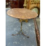 AN IRON ROUND TOPPED TRIPOD TABLE. Dia. 66 x H.74cms.