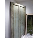 A PAIR OF 19th.C.PAINTED PINE DOORS EACH WITH TWO LONG PANELS. 247 x 104cms. (2)