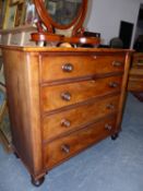 A VICTORIAN MAHOGANY CHEST OF FOUR GRADED DRAWERS EACH WITH TURNED KNOB HANDLES ABOVE BUN FEET. W.
