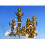 SEVEN INDIAN BRONZE FIGURES OF DEITIES AND DANCERS, THE TALLEST DEPICTING SARUMAN ON ONE SIDE AND