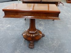 A 19th.C. MAHOGANY TEA TABLE, THE RECTANGULAR SWIVEL TOP ON A HEXAGONAL COLUMN FLARING TO A