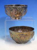 A PAIR OF KUHN AND KOMOR YOKOHAMA SILVER BOWLS WITH IRISES IN RELIEF ON THE EXTERIOR AGAINST A