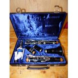 A CASED BUFFET WHITE METAL MOUNTED BLACK PLASTIC CLARINET NUMBERED B12.