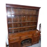 A GEORGIAN COUNTRY OAK DRESSER WITH PLATE RACK OVER. 170 x 41 x 203cms.