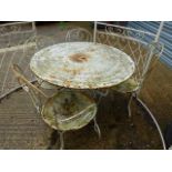 A FRENCH WROUGHT IRON CIRCULAR TOP PATIO TABLE AND FOUR SIMILAR CHAIRS. Dia.97cms.