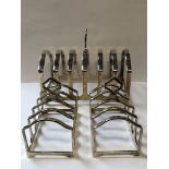 THREE SILVER HALLMARKED TOAST RACKS, DATED 1949-1952, FOR ADIE BROS LTD. GROSS WEIGHT 340.4grms.