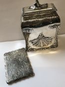 A VICTORIAN SILVER HALLMARKED TEA CADDY WITH HINGED COVER AND FLORAL FINIAL, MEASUREMENTS 14.5cms