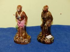 TWO ANTIQUE MAJOLICA STANDING FIGURES OF MONKEYS. H 19cms.