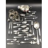 A QUANTITY OF SILVER HALLMARKED ITEMS TO INCLUDE A SAUCE BOAT, NINE ASSORTED NAPKIN RINGS, A SHELL