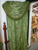 A PAIR OF LARGE GREEN FLORAL AND CHINOISERIE PATTERN LINED AND INTERLINED CURTAINS