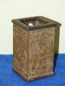 A CHINESE HARDWOOD BRUSH POT OF SQUARE SECTION, THE SIDES CARVED IN RELIEF WITH FIGURES BY RIVERS