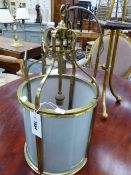 A FROSTED GLASS AND BRASS CYLINDRICAL LANTERN WITH SINGLE LAMP SOCKET. H.50 x Dia.24.5cms.
