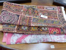 AN INDIAN PRINTED PANEL TOGETHER WITH VARIOUS EMBROIDERED PIECES TO INCLUDE CUSHION COVERS.