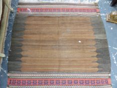 A BELOUCH FLAT WOVEN PANEL TOGETHER WITH TWO CUSHIONS. (3)