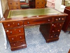 A VICTORIAN MAHOGANY PEDESTAL DESK, THE LEATHER INSET TOP OVER THREE APRON DRAWERS, THREE FURTHER