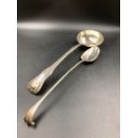 A 19th C. KINGS PATTERN LADLE AND A SILVER SERVING SPOON. GROSS WEIGHT 444grms.