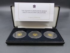 A BOXED JUBILEE MINT SET OF THREE 9ct. GOLD 2018 COINS FROM AN EDITION OF 499. 1 GRAM.