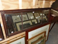 A ROSEWOOD FRAMED THREE PLATE RECTANGULAR MIRROR, BRASS ROSETTES TO EACH CORNER, HALF ROUND DISC