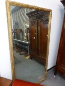 A LARGE 19th.C.GILT FRAMED OVERMANTLE MIRROR. 108 x 208cms.