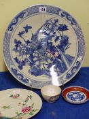 A 19th C. CHINESE BLUE AND WHITE PLATE PAINTED WITH A PHEASANT AMONGST PEONIES. Dia. 37cms. AN