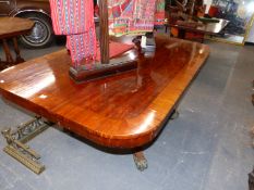 AN EARLY 19th.C. CROSS BANDED MAHOGANY BREAKFAST TABLE, THE ROUNDED RECTANGULAR TOP ON BALUSTER