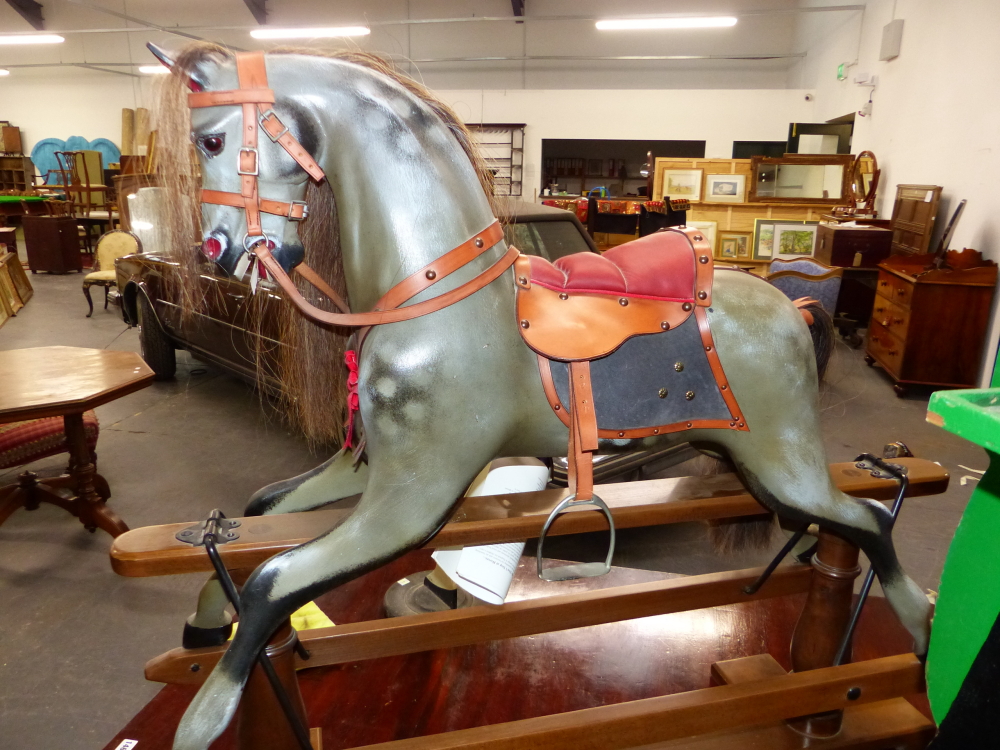 A STEVENSON BROTHERS DAPPLED GREY ROCKING HORSE WITH LEATHER BRIDLE AND RED SEATED SADDLE. H.95cms. - Image 4 of 5