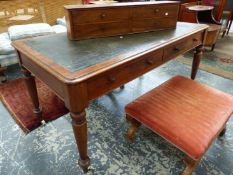 A VICTORIAN MAHOGANY WRITING TABLE, THE GREEN LEATHER INSET TOP OVER TWO DRAWERS, THE TAPERING