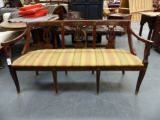 AN EARLY 19th.C.BIEDERMEIER MAHOGANY AND BRASS INLAID CHAIR BACK SETTEE, THE ARMS WITH SWAN HEAD