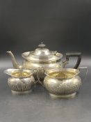 A VICTORIAN SILVER HALLMARKED THREE PART TEA SET WITH EBONY HANDLE AND FINIAL, MADE BY MAPPIN & WEBB