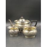 A VICTORIAN SILVER HALLMARKED THREE PART TEA SET WITH EBONY HANDLE AND FINIAL, MADE BY MAPPIN & WEBB