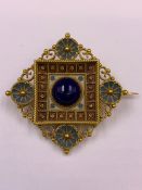 AN ANTIQUE GOLD, ENAMEL AND CABOCHON LAPIS BROOCH. MEASUREMENT 4.5cms, WEIGHT 10.8grms.