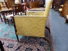 A 19th.C. MAHOGANY LIBRARY ARMCHAIR, THE SQUARED BACK AND SIDES UPHOLSTERED, THE HANDRESTS ABOVE