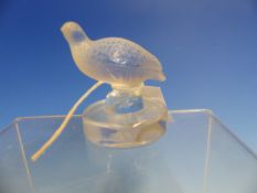 LALIQUE FRANCE. A FROSTED GLASS GROUSE ON CYLINDRICAL PLINTH. H 6cms.