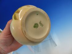 A ROYAL WORCESTER PORCELAIN POT POURRI AND COVER DATE CODE FOR 1909 PAINTED ON EACH SIDE WITH ROSES.