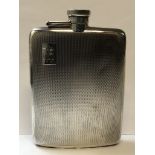 A SILVER HALLMARKED HIP FLASK WITH HINGED COVER DATED 1916, FOR WILLIAM NEAL & SON LTD. WEIGHT 161.