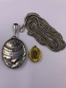 A LARGE VICTORIAN SILVER ORNATE LOCKET, HALLMARKED BIRMINGHAM 1893, SUSPENDED ON AN ANTIQUE CURB