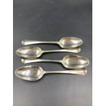 A SET OF FOUR GEORGIAN SILVER HALLMARKED DESSERT SPOONS, DATED 1749 FOR ELIZABETH JACKSON. GROSS