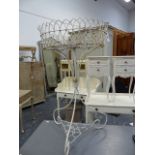 AN ANTIQUE WIREWORK CONSERVATORY PLANTSTAND. Dia.49 x H.86cms.