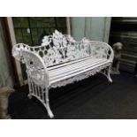 A PAIR OF VINTAGE CAST IRON GARDEN BENCHES IN COALBROOKDALE OAK LEAF PATTERN, LATER RE PAINTED. W.