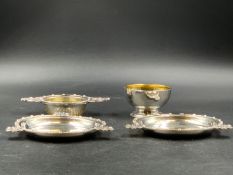 AN IRISH SILVER TEA STRAINER, DRIP CUP AND TWO WAFER DISHES BEARING THE 1966 COMMEMORATIVE 50th