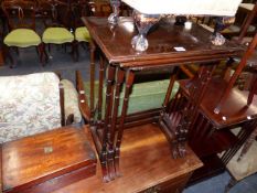 AN EDWARDIAN NEST OF TABLES, A STOOL AND A WRITING BOX.