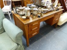 AN OAK WRITING DESK.