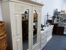 AN EDWARDIAN PAINTED WARDROBE, A PAINTED CHIFFONIER AND A SMALL FOUR DRAWER CHEST.