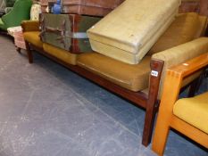 A MID CENTURY ROSEWOOD FRAMED SETTEE.