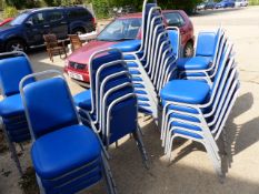 A SET OF STACKING CHAIRS