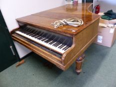 AN EARLY 19TH CENTURY WALNUT GRAND PIANO