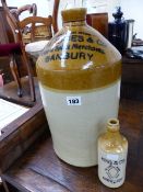 A BANBURY FLAGON AND A SMALL GINGER BEER BOTTLE.