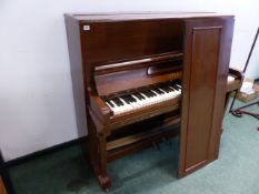 A MAHOGANY CASED LESTEL UPRIGHT PIANO.