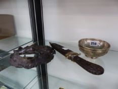 A WHITE METAL PRESENTATION BOWL (BRUNEI AND JAPAN) A CARVED DAGGER AND A BALINESE BRONZE MASK.